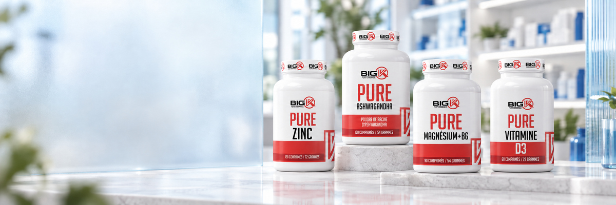 Zinc, ashwagandha, magnésium et vitamine D3 Big K Performance dans un décor clair bleu et blanc.